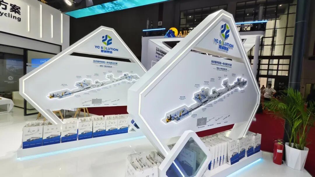 YC SOLUTION booth display showing multiple PV module recycling process routes at SNEC 2026